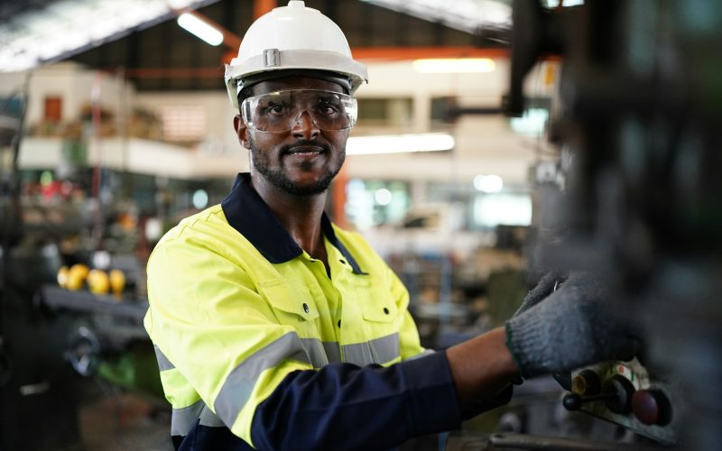 industrial factory worker working in metal manufacturing industry